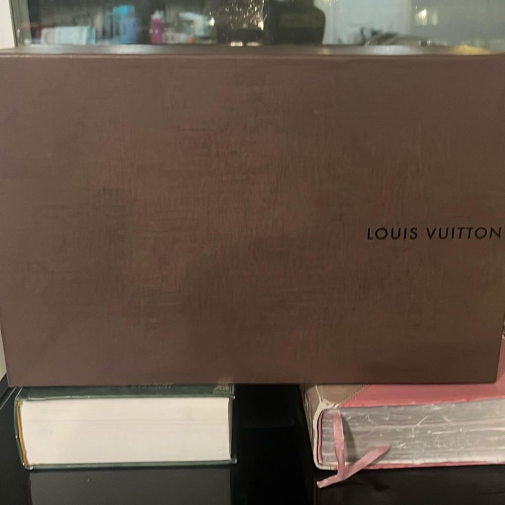 Selling a Louis Vuitton, two of them.